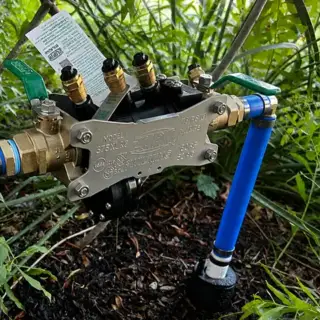 New 1-inch Zurn RPZ backflow preventer installed by GPS Plumbing in Newman Village, Frisco, Texas.