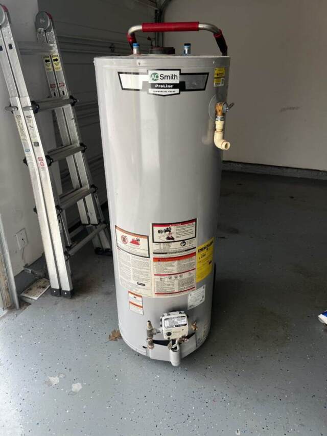 nstalled a new 50-gallon Bradford White gas water heater in the garage