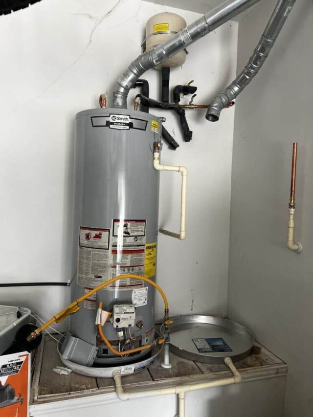 nstalled a new 50-gallon Bradford White gas water heater in the garage
