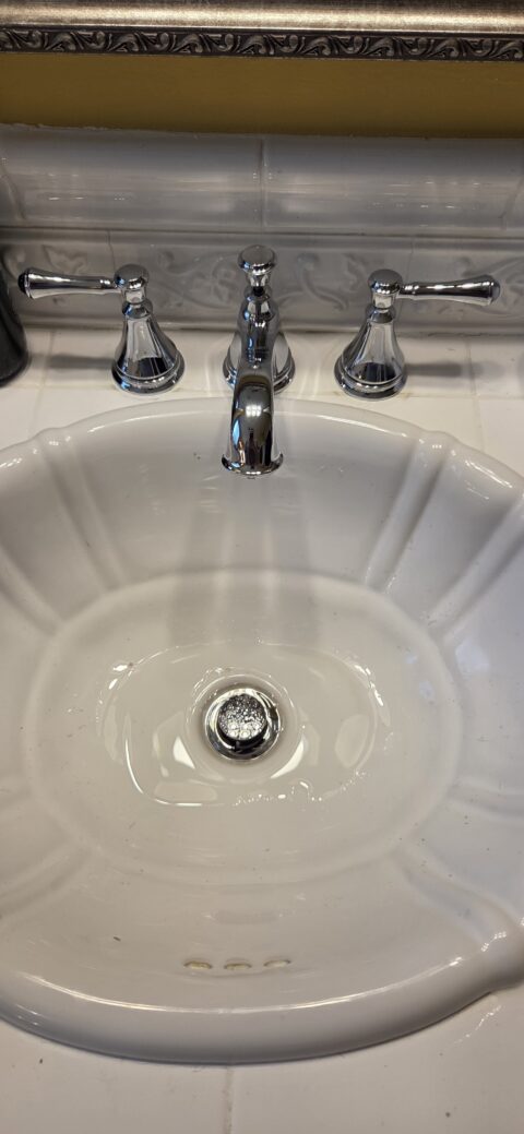 Widespread bathroom sink faucet replacement completed