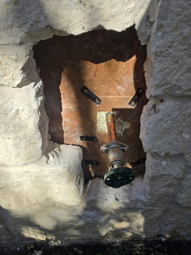 Replaced hose bib after the original broke inside the wall, installing a new drop-ear fitting and securely mounting it for long-term durability.