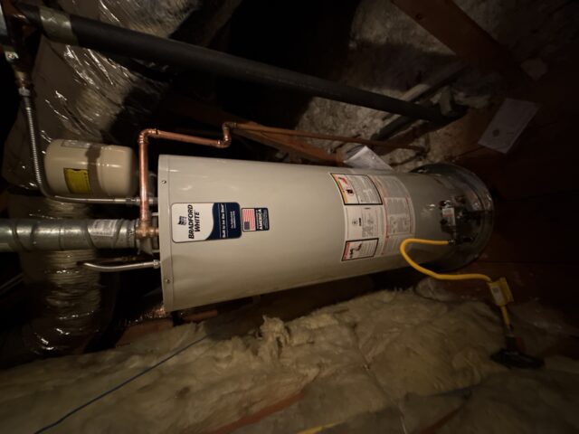 New Bradford White tank water heater installed in attic