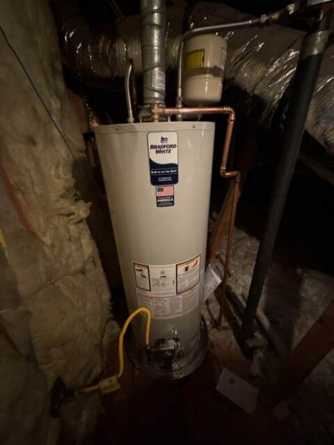 New Bradford White tank water heater installed in attic