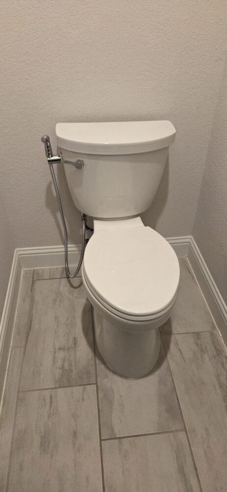 Reset toilet after fixing a loose, rocking base.