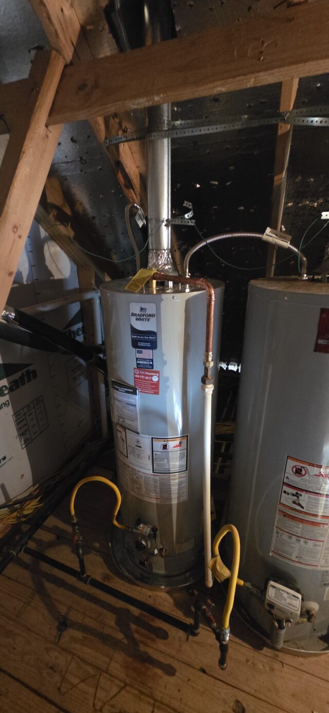 Newly installed Bradford White water heater in attic