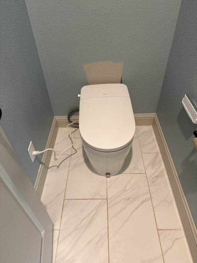 Completed installation of a Moen smart toilet