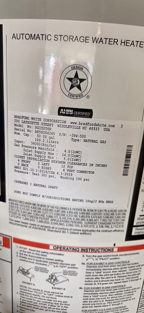 Newly installed Bradford White tank water heater.