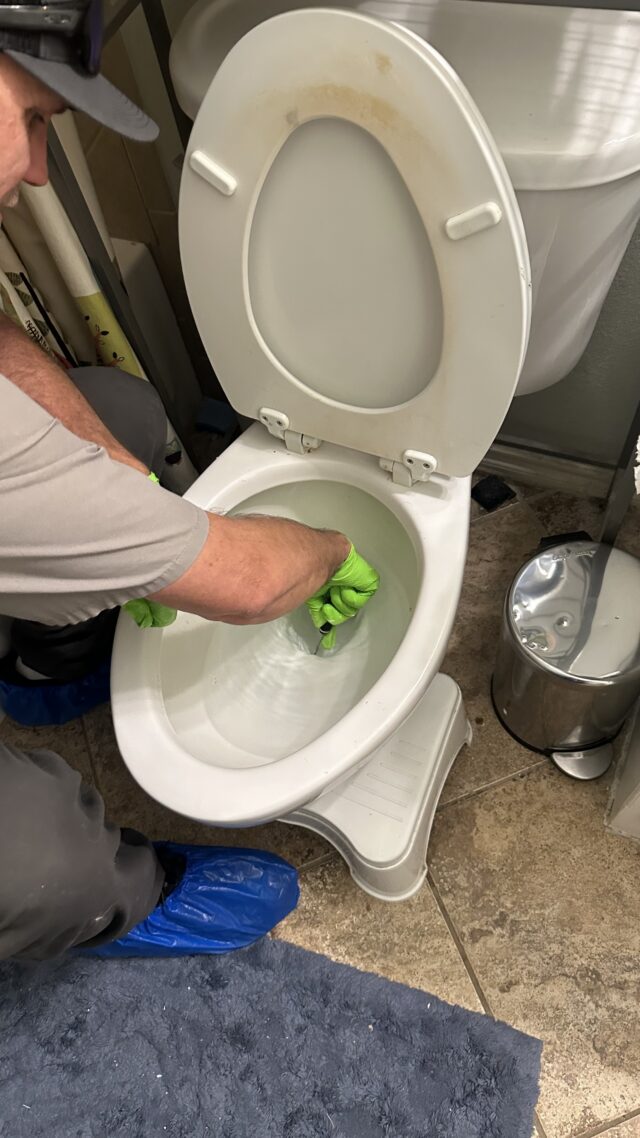 Steve clearing foreign plastic objects found in toilet