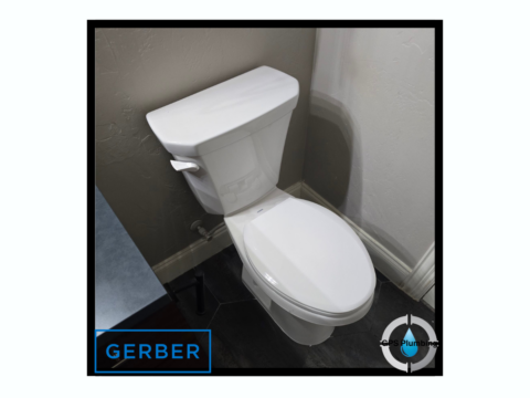 New white Gerber comfort height elongated toilet with soft-closing seat installed in Frisco home bathroom