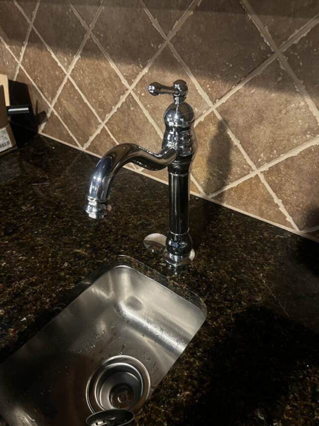 Leaking faucet sink repaired